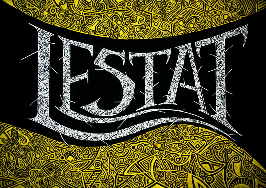 “Lestat” in spiked silver capitals filled with pattern, between two bands of golden ornament on black paper.