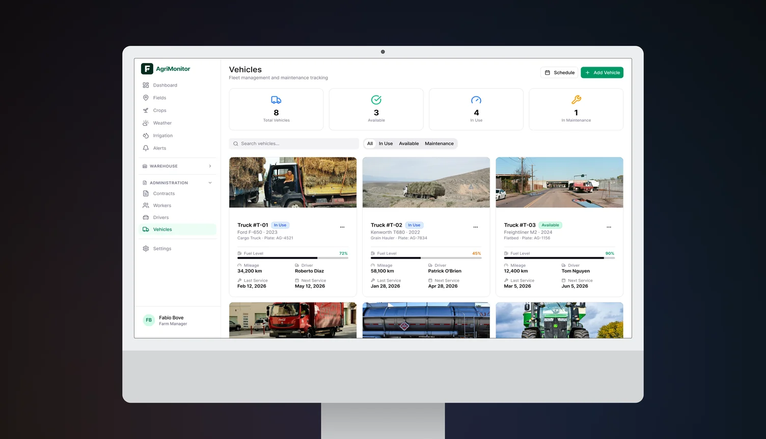 Fleet management screen with vehicle cards showing status, fuel level, mileage, assigned driver and service dates